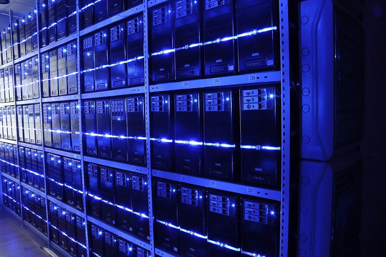 Rows of network cabinets in a client data hall